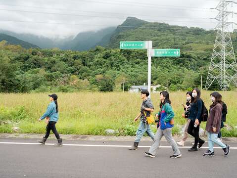 Ciyakang _ Truku youth guide travelers on a walking tour through the community_